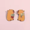 Pin capibara con flores en cali