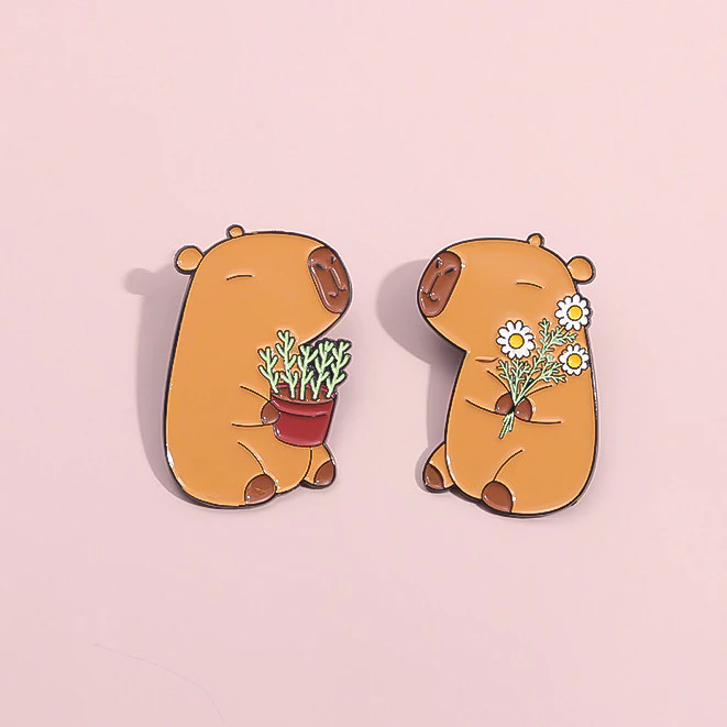 1727516779711 Pin capibara con flores en cali