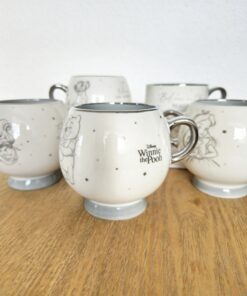 Taza Premium Disney 100 de winnie pooh en colombia