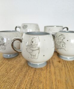 Taza Premium Disney 100 de winnie pooh en colombia